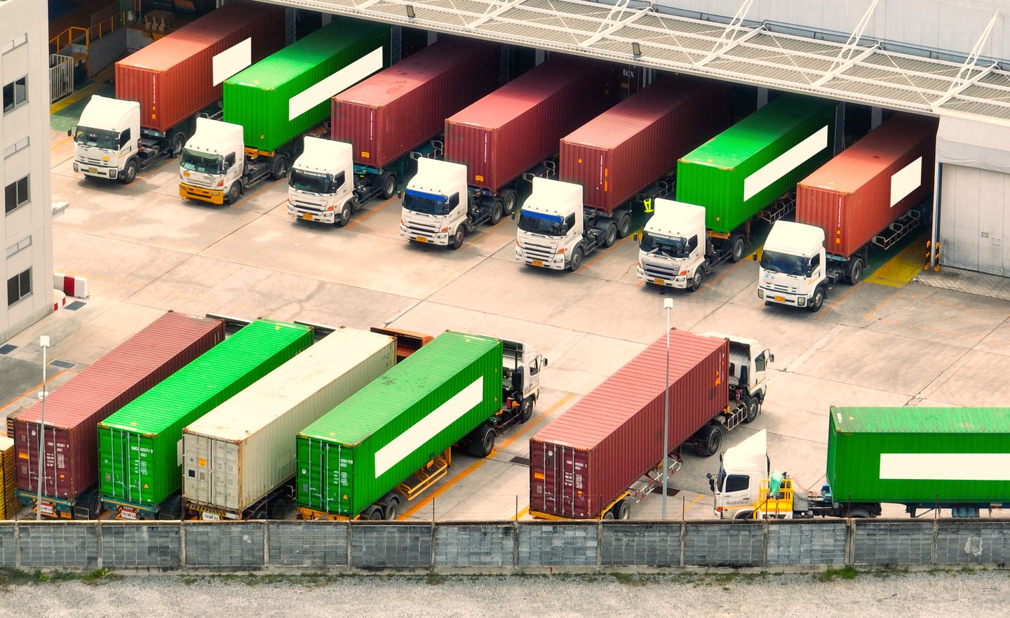 Aerial view of trucks at warehouse loading docks